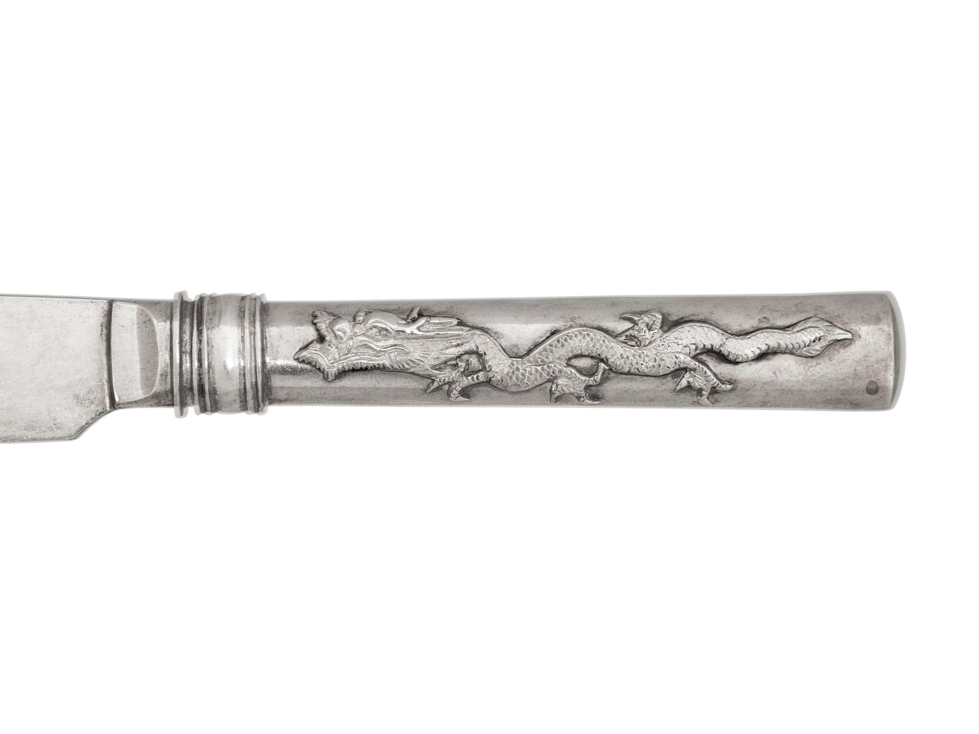 A Set of Six Chinese Export Silver Dessert Knives