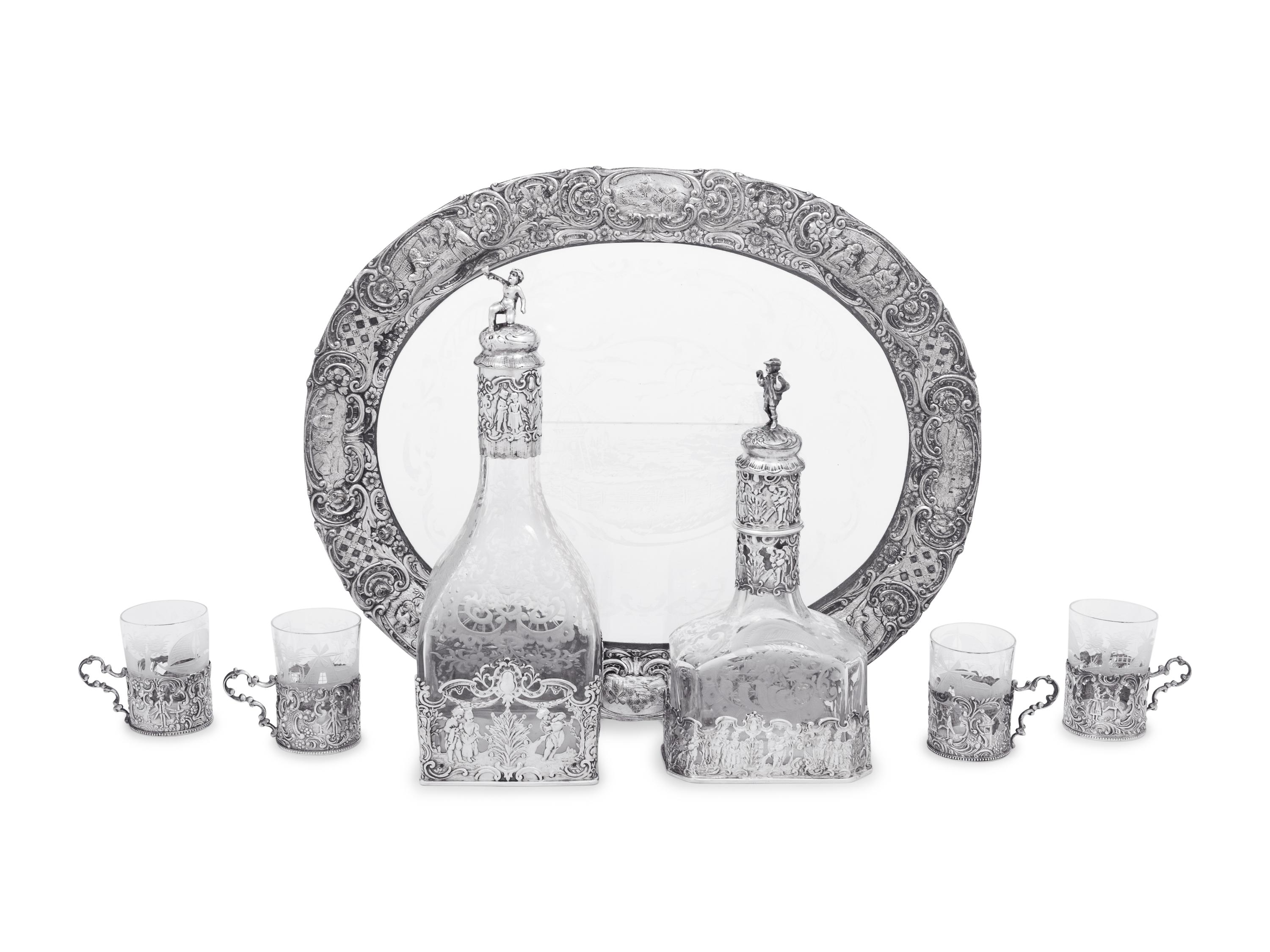A Continental Silver Mounted Etched Glass Drink Service
