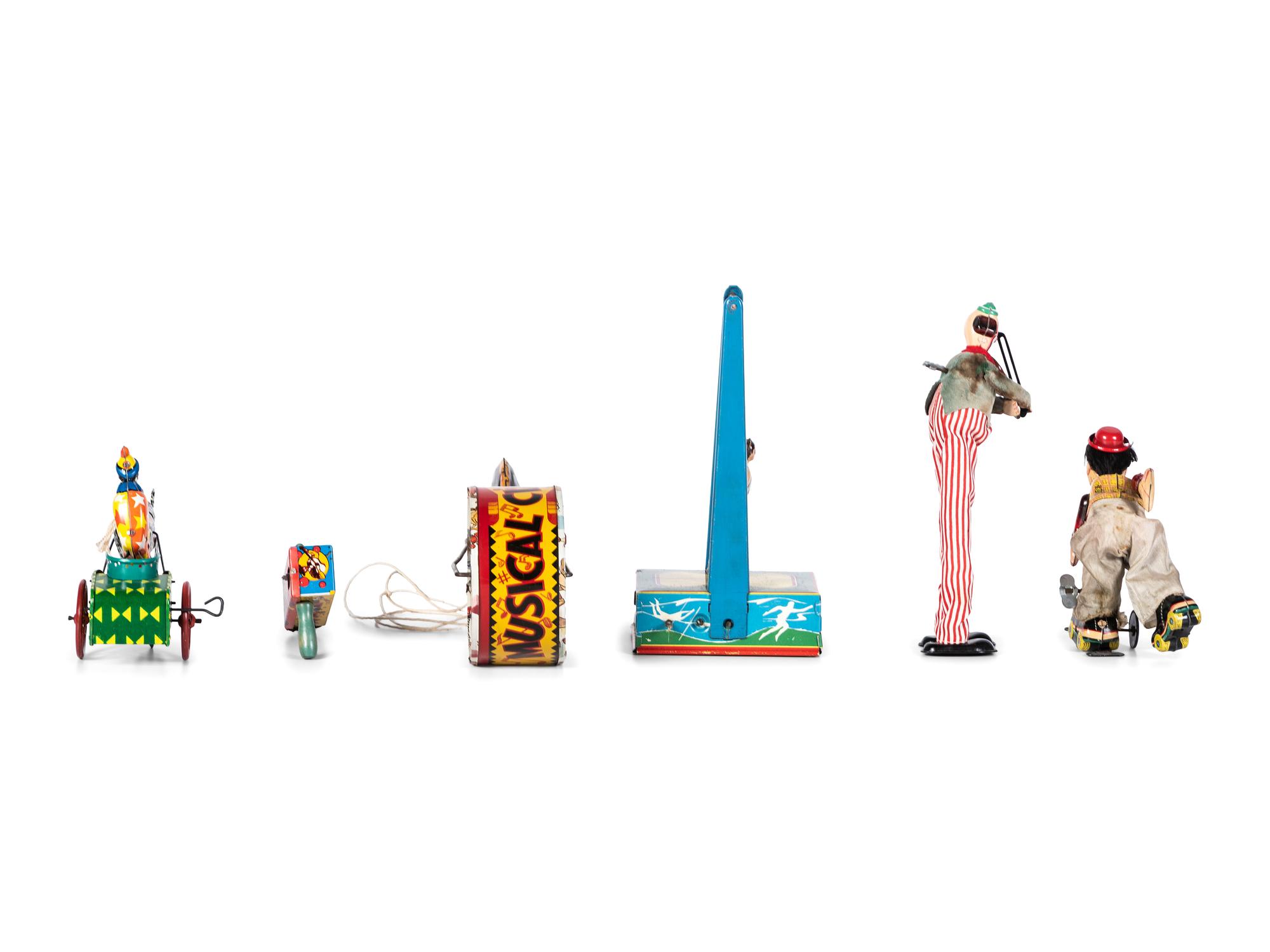 Six Tin Clown and Circus Toys