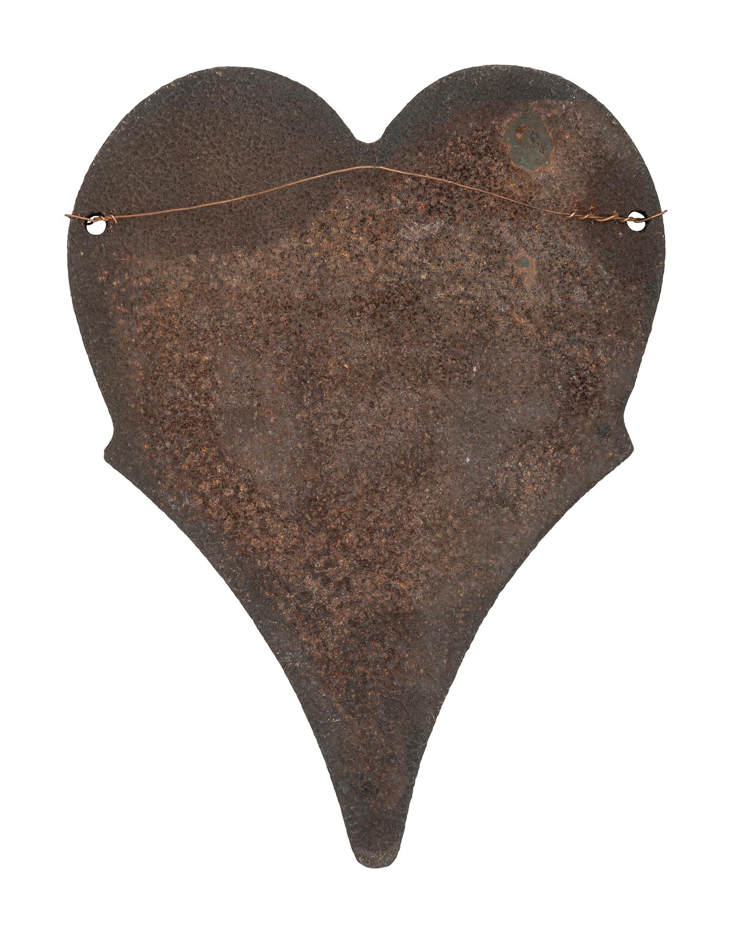 A Pair of Cast Iron Kettle Toppers and Two Trivets
