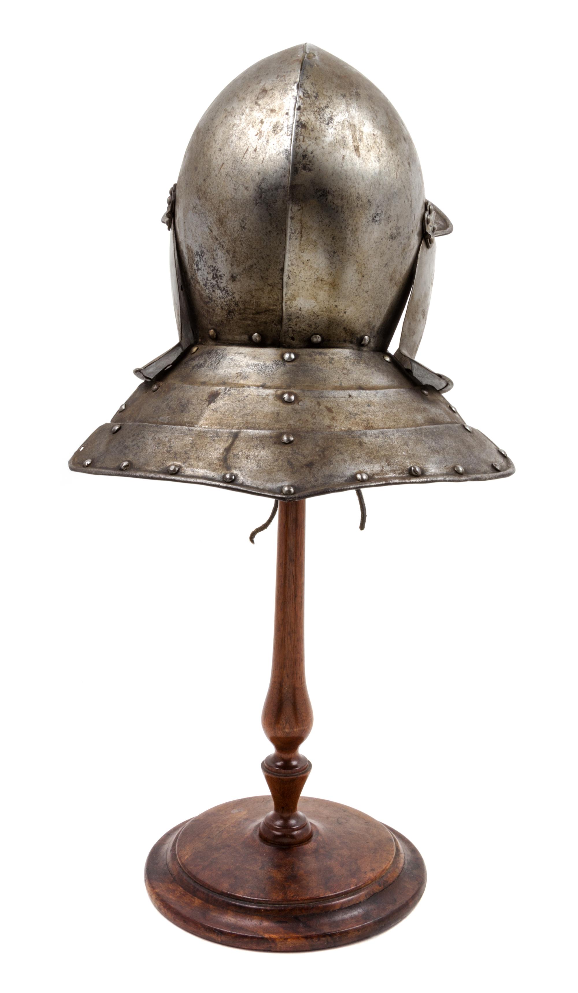 A Cromwellian Lobster Tail Helmet Height 24 3/4 inches. — 17TH CENTURY