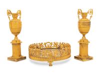 A Louis-Philippe Gilt Bronze Surtout de Table and a Pair of Restauration Gilt Bronze Urns