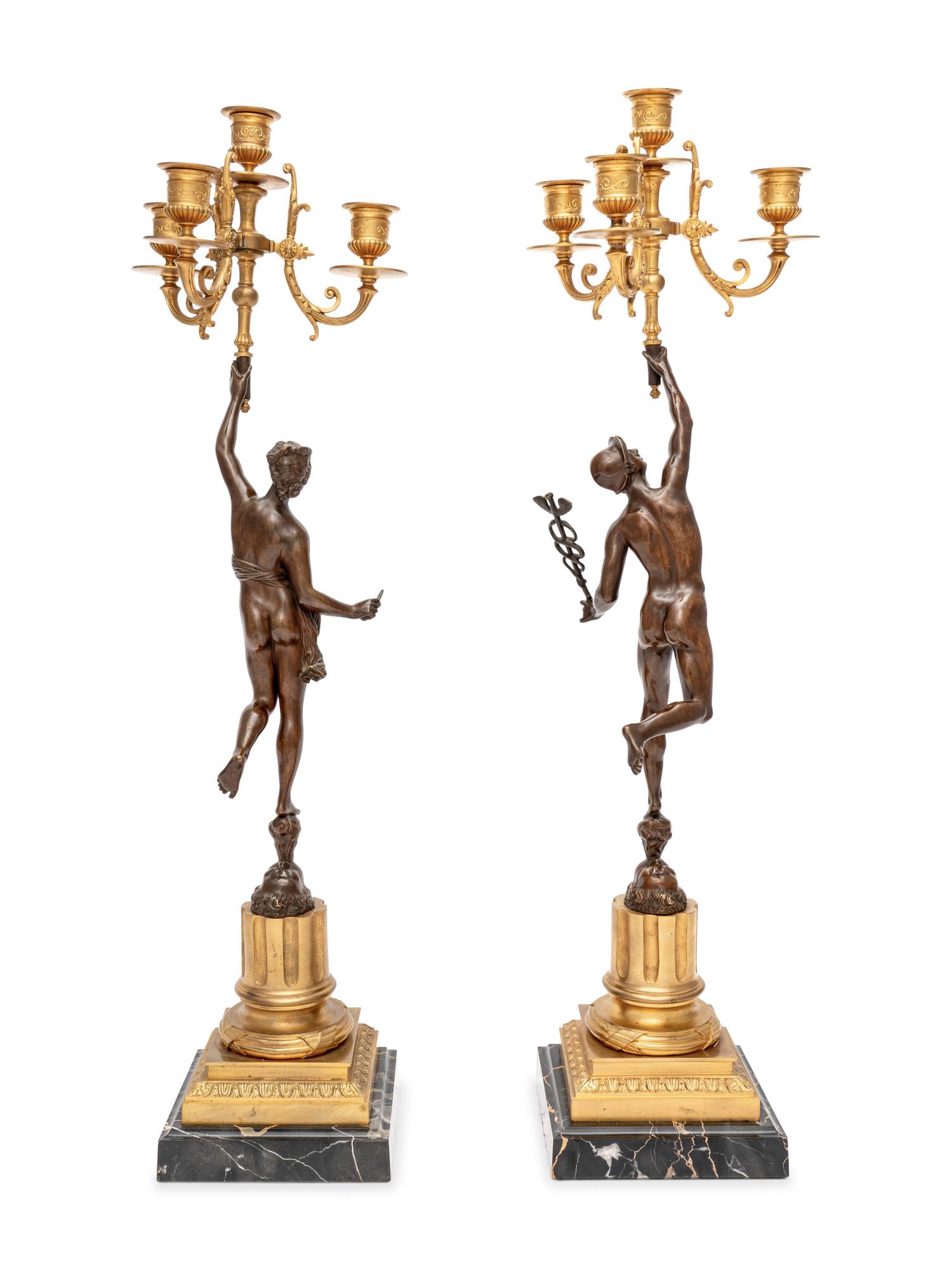 A Pair of Gilt and Patinated Bronze Figural Four-Light Candelabra