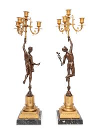 A Pair of Gilt and Patinated Bronze Figural Four-Light Candelabra