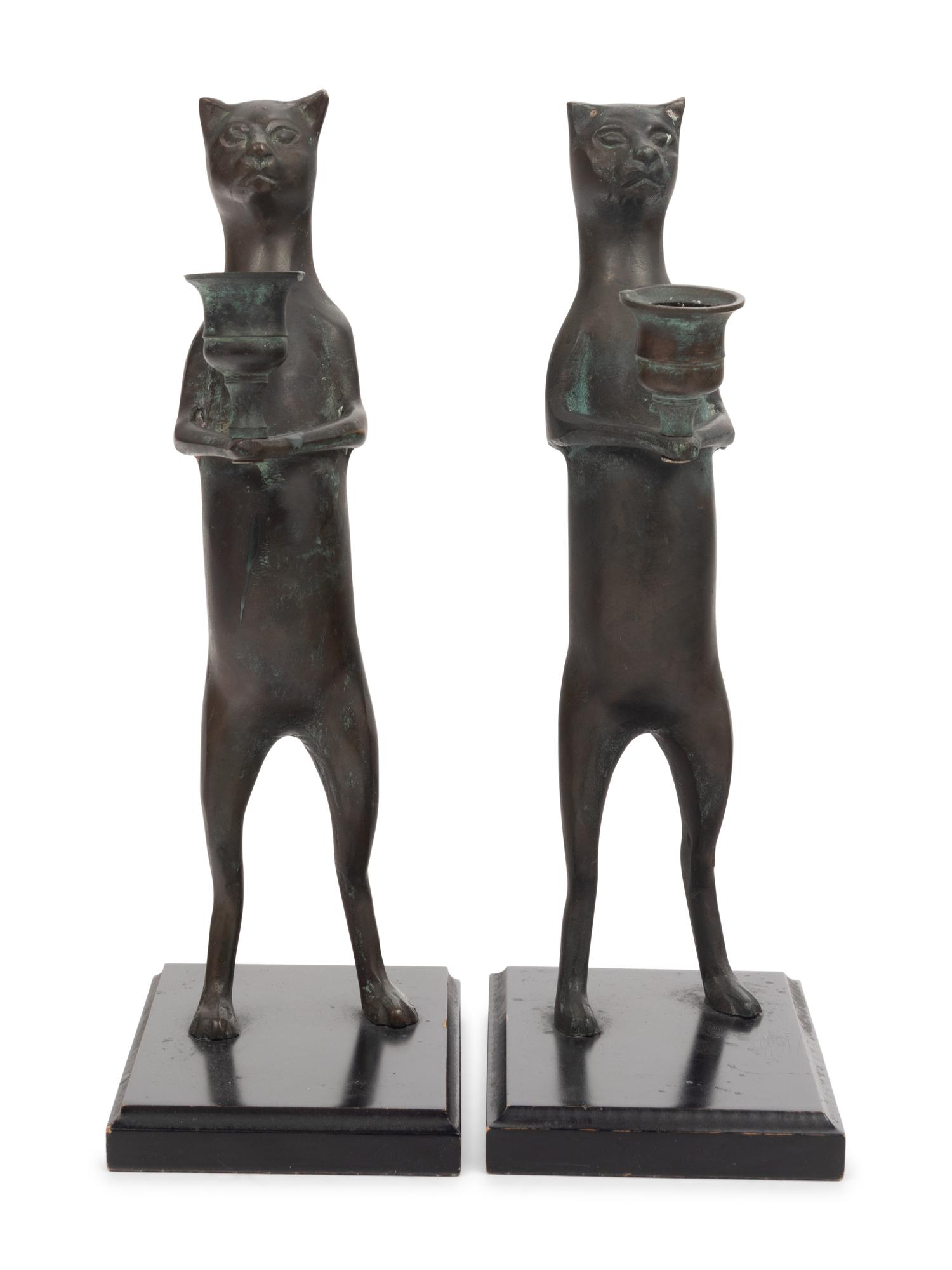 A Pair of Pewter Cat-Form Candlesticks