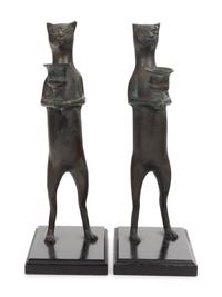 A Pair of Pewter Cat-Form Candlesticks