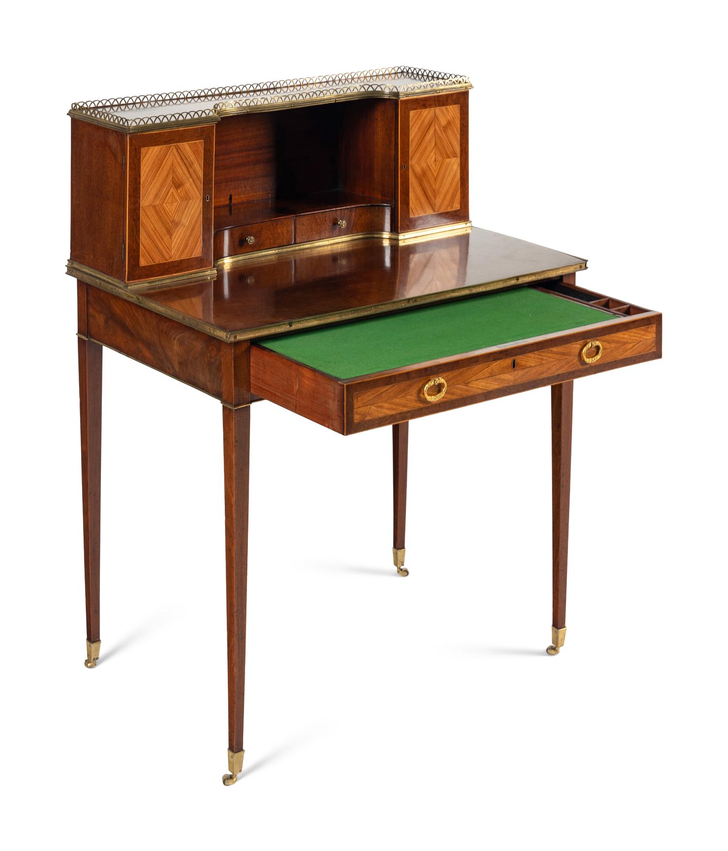 A Regency Tulipwood and Mahogany Bonheur du Jour