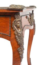 A Louis XV Style Gilt Metal Mounted Walnut Bureau Plat