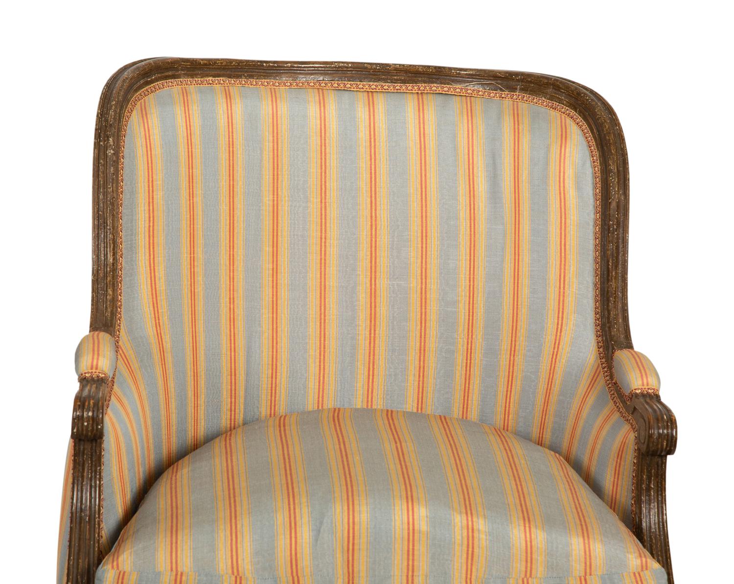 A Pair of Louis XVI Style Faux Finish Bergeres