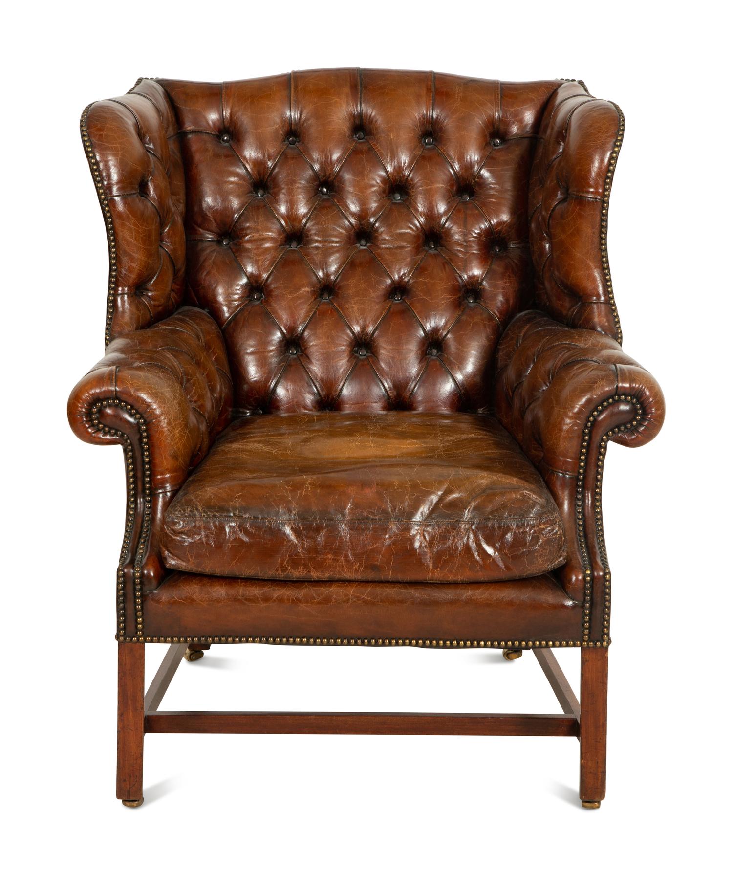 A George III Style Leather Wingback Armchair