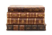A French Faux Book Form Decanter Set Width 8 1/2 inches.