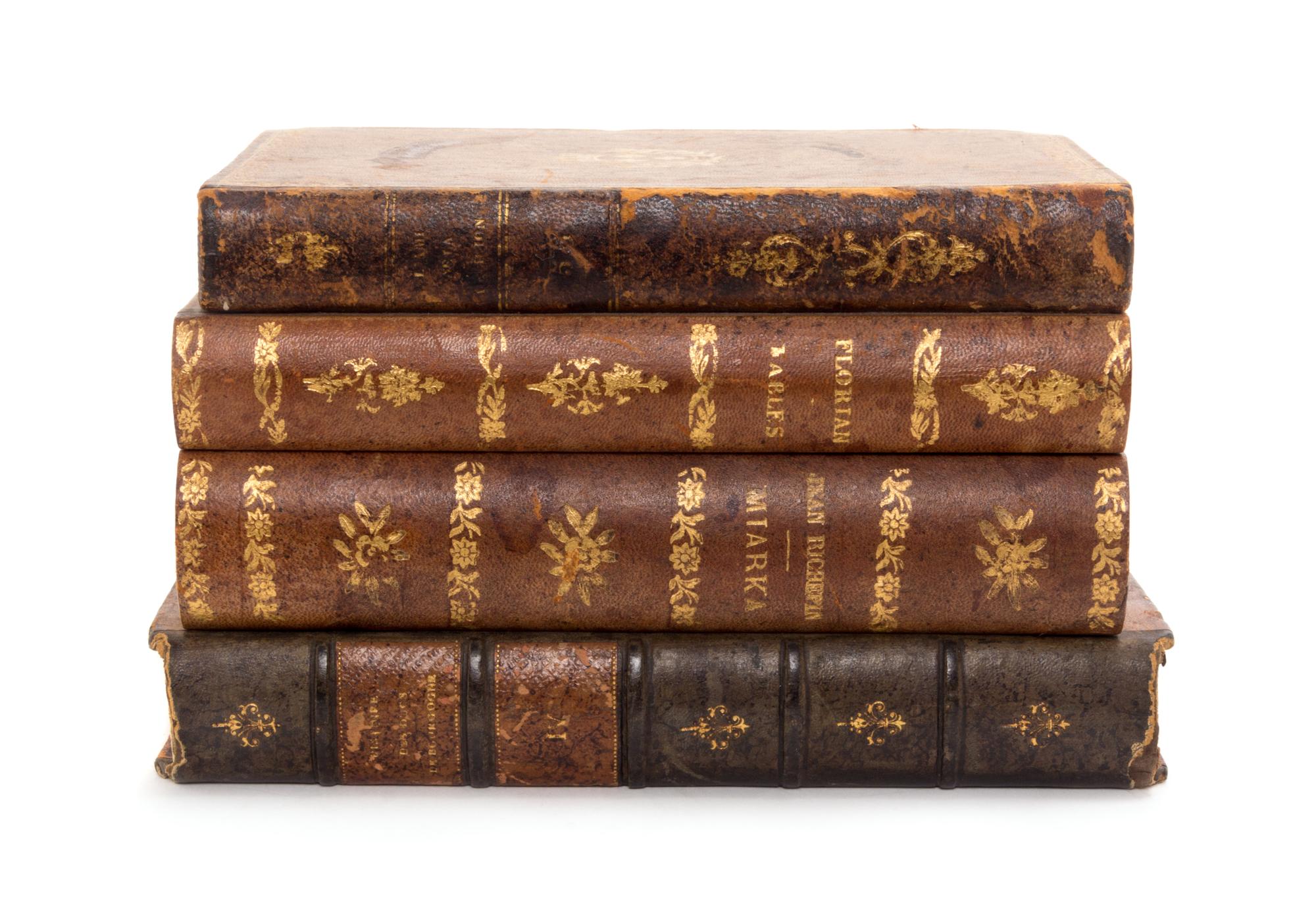 A French Faux Book Form Decanter Set Width 8 1/2 inches.