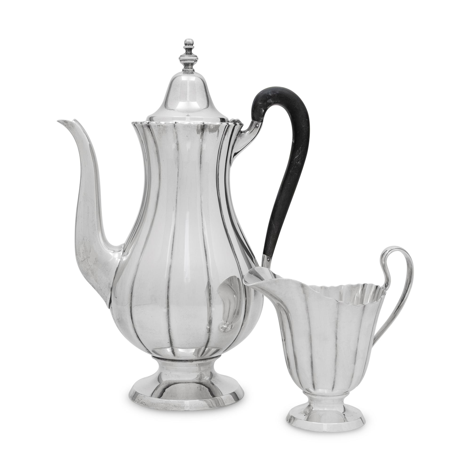 An American Silver Coffee Pot and Creamer