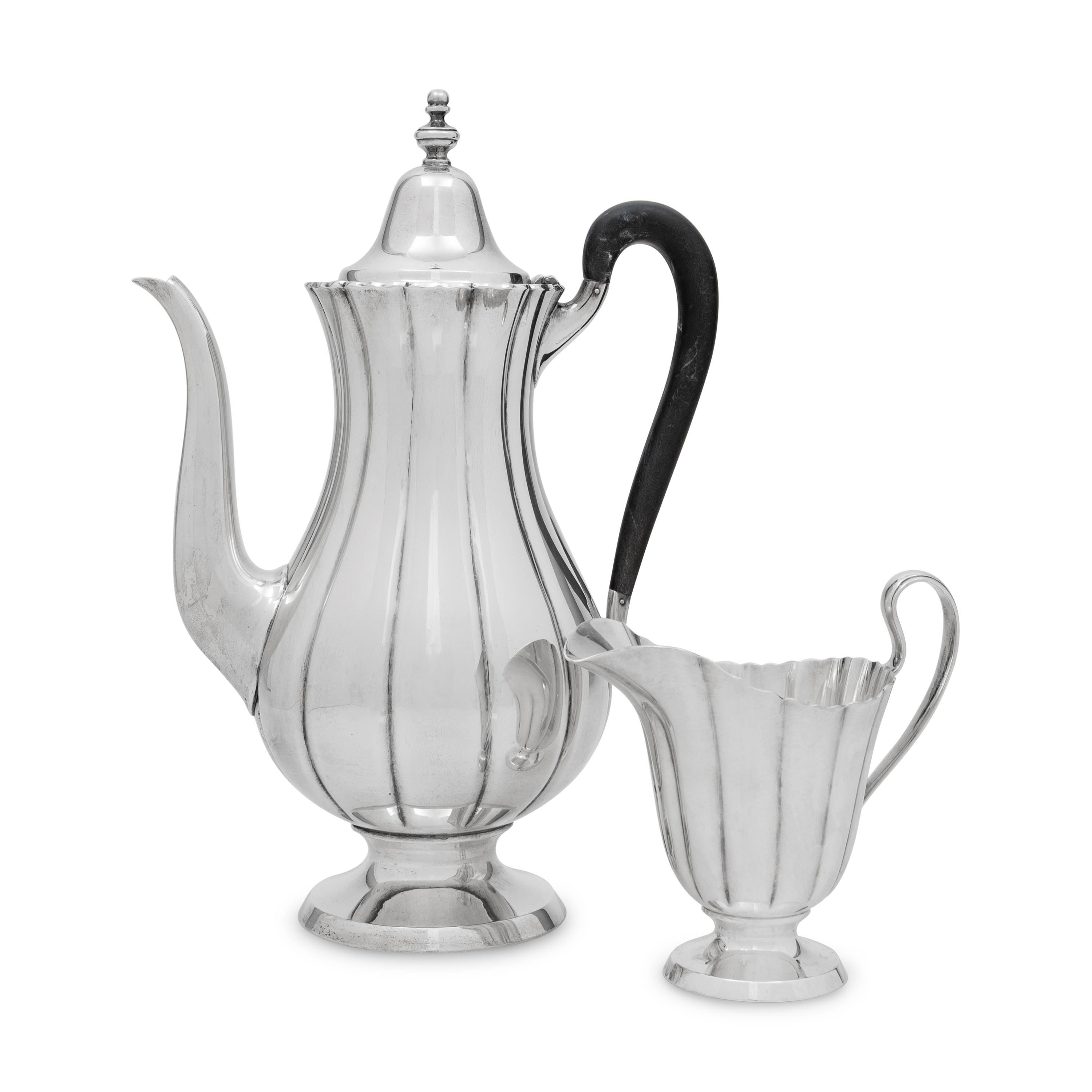 An American Silver Coffee Pot and Creamer