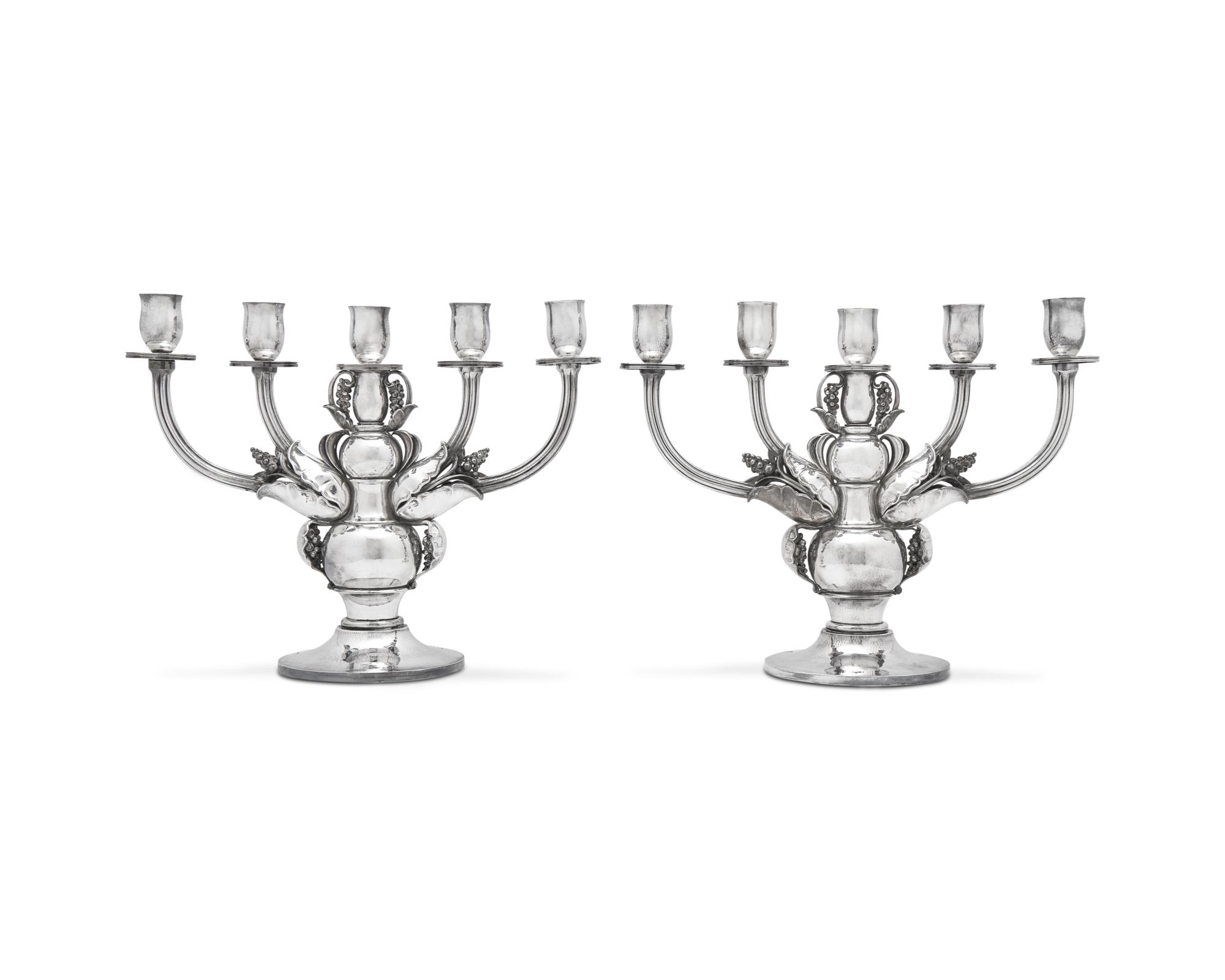 A Pair of Georg Jensen Designed Silver Five-Light Candelabra