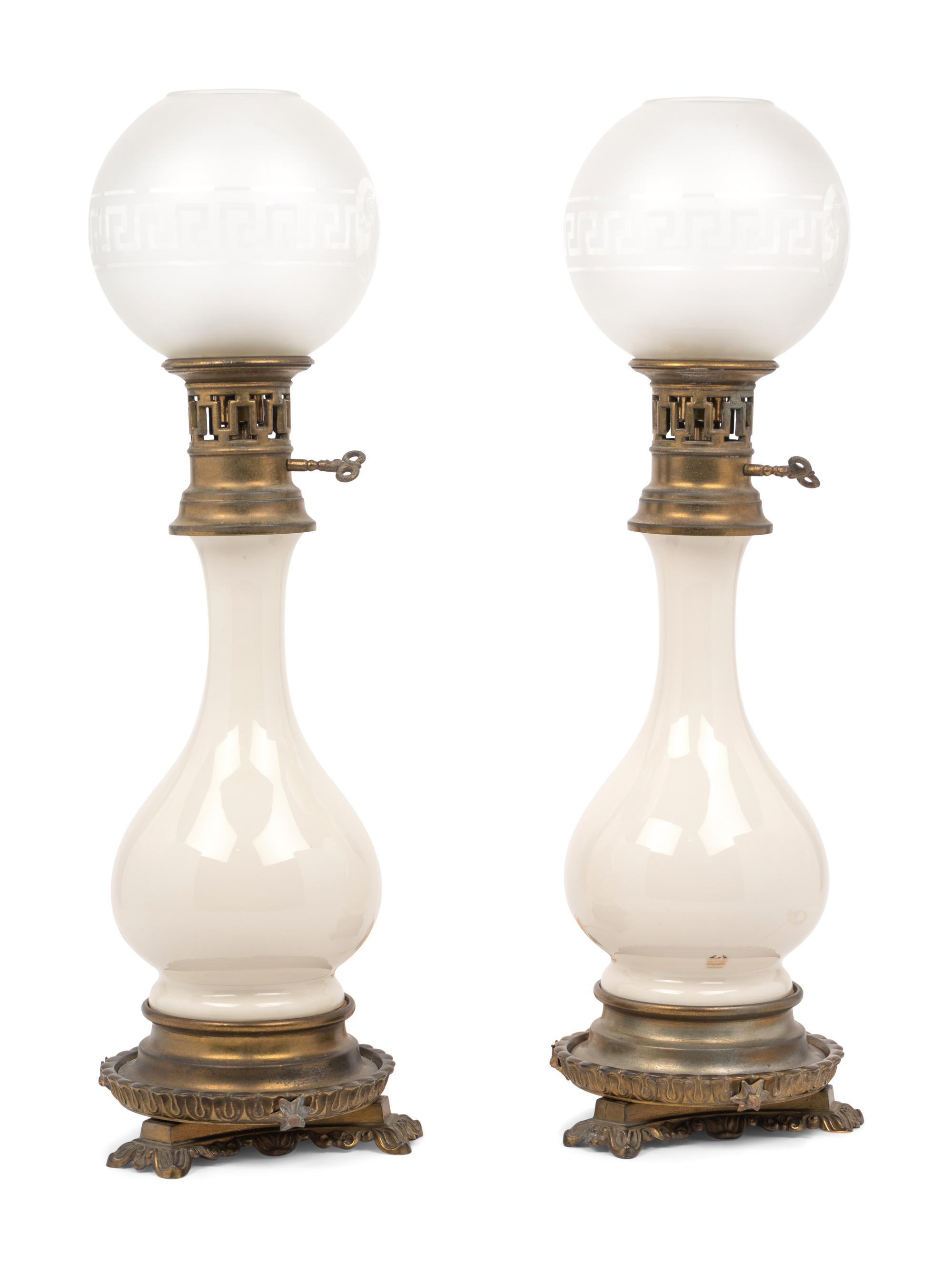 A Pair of French Opaline Glass Fluid Lamps with Etched Glass Shades Converted to Electricity