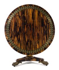 A Regency Brass Inlaid Calamander Center Table Height 29 1/4 x diameter of top 47 1/2 inches. — MANNER OF GEORGE BULLOCK, CIRCA 1815
