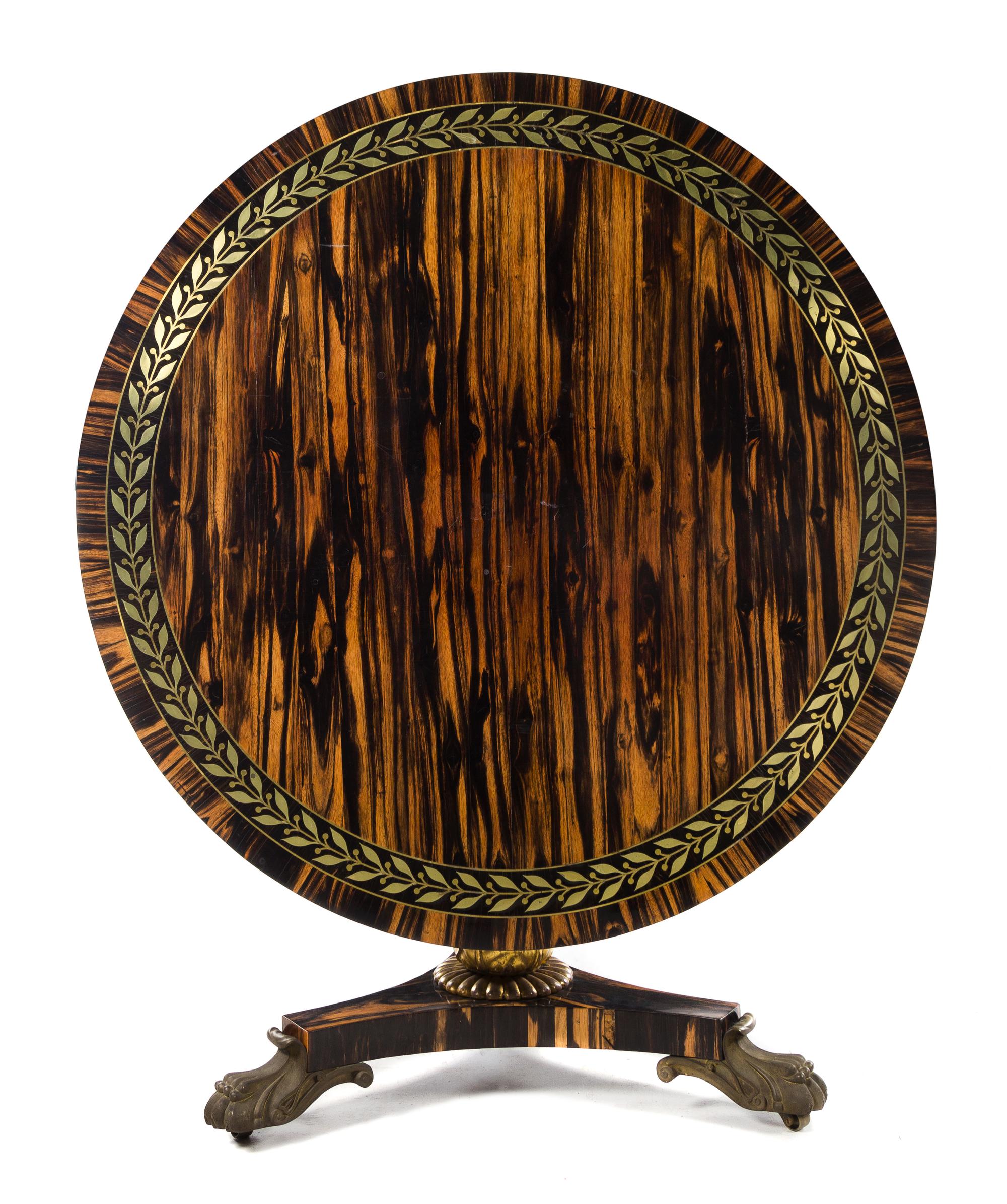 A Regency Brass Inlaid Calamander Center Table Height 29 1/4 x diameter of top 47 1/2 inches. — MANNER OF GEORGE BULLOCK, CIRCA 1815