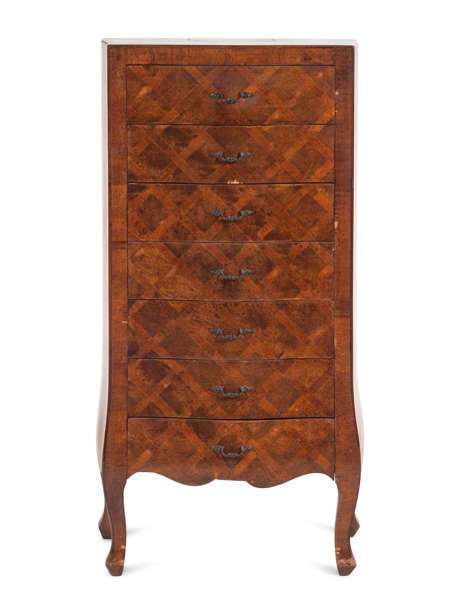 An Italian Walnut and Parquetry Chest of Drawers