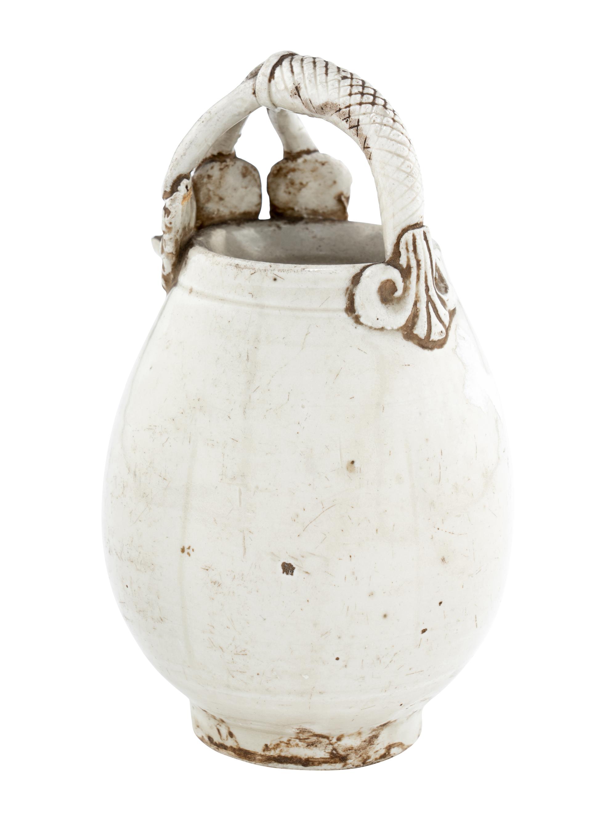 A Small Chinese Ding -Type Porcelain White Glazed Ewer