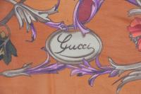 Four Designer Silk Scarves Including Lalique, Gucci, and YSL