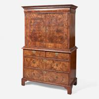 A William & Mary oyster veneered walnut secretary bookcase circa 1700