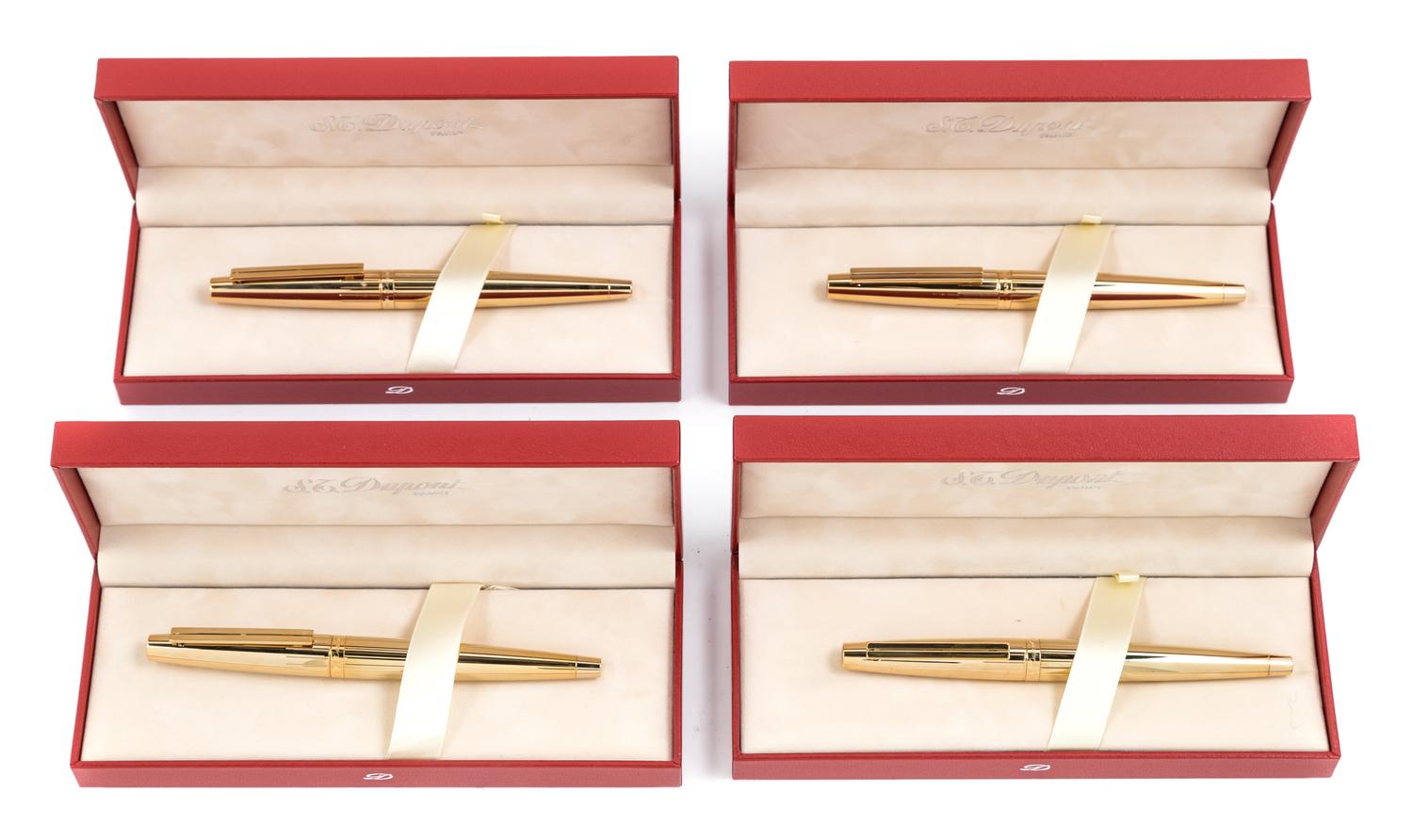 A Group of Four S.T. Dupont Gold-Plated Ellipsis Fountain Pens