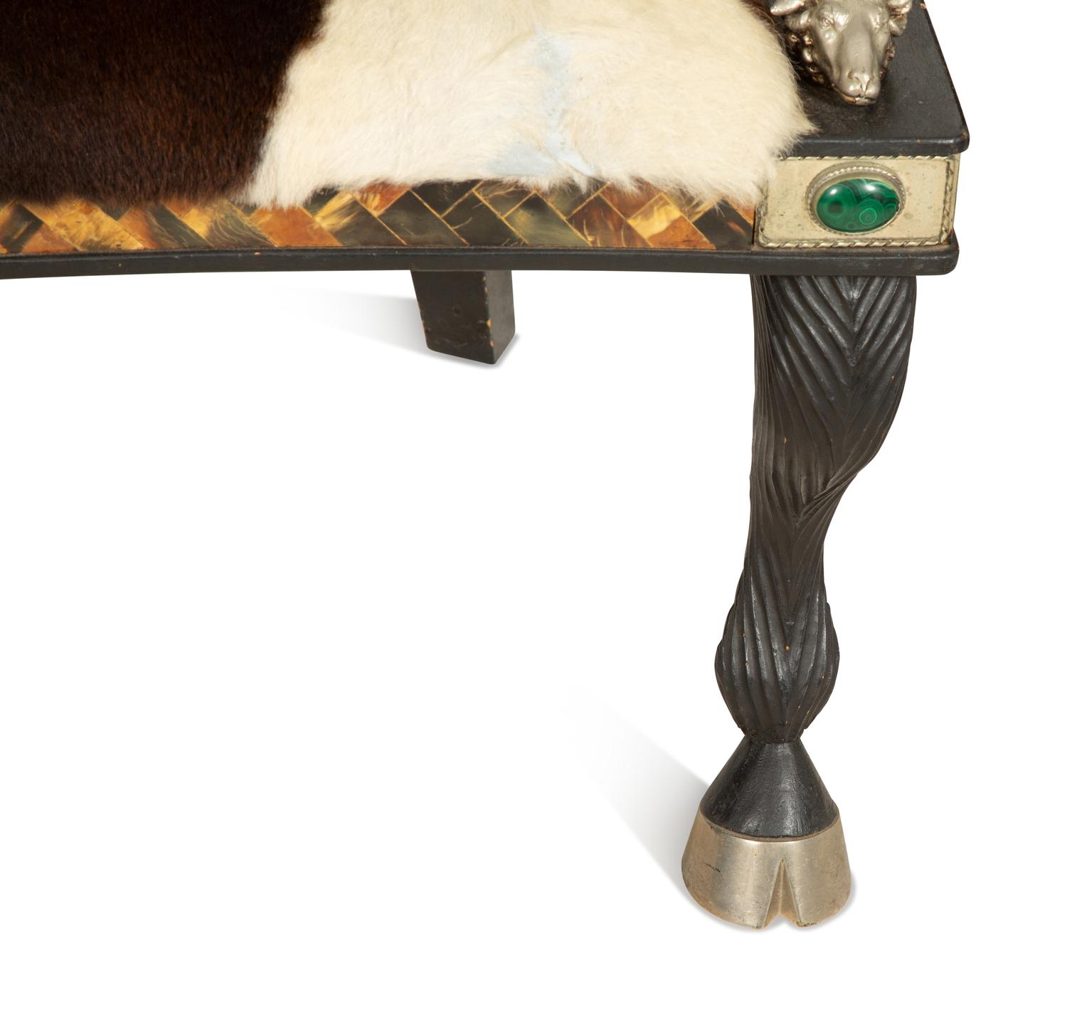A Pair of Anthony Redmile Longhorn Chairs with Cow Hide Upholstery