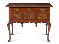 A Queen Anne Fan-Carved Walnut Dressing Table