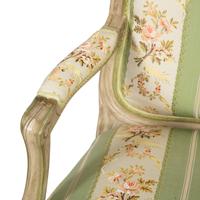 A Pair of Louis XV Style Green-Painted Fauteuils