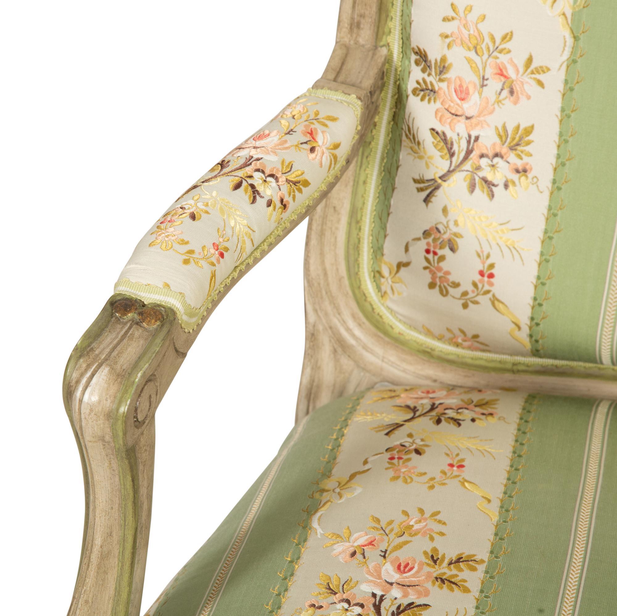 A Pair of Louis XV Style Green-Painted Fauteuils