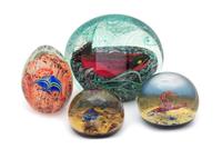 Orient & Flume and Caithness, , four glass paperweights, each decorated with aquatic life