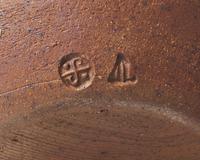 Bulbous vase with lugs
