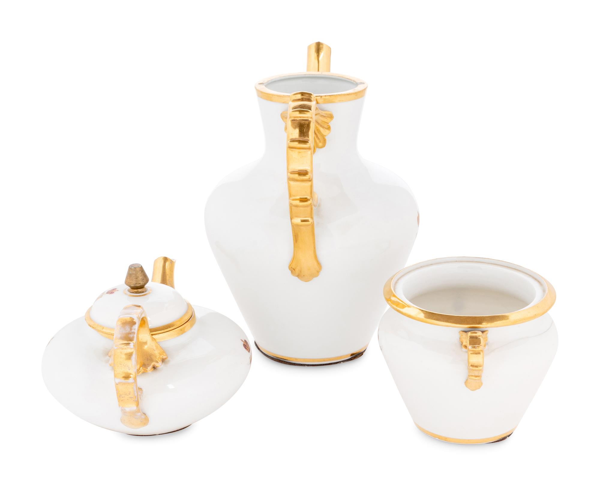 A Russian Porcelain Three-Piece Tea and Coffee Service
