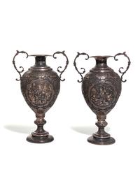A Pair of Persian Silvered Copper Vases