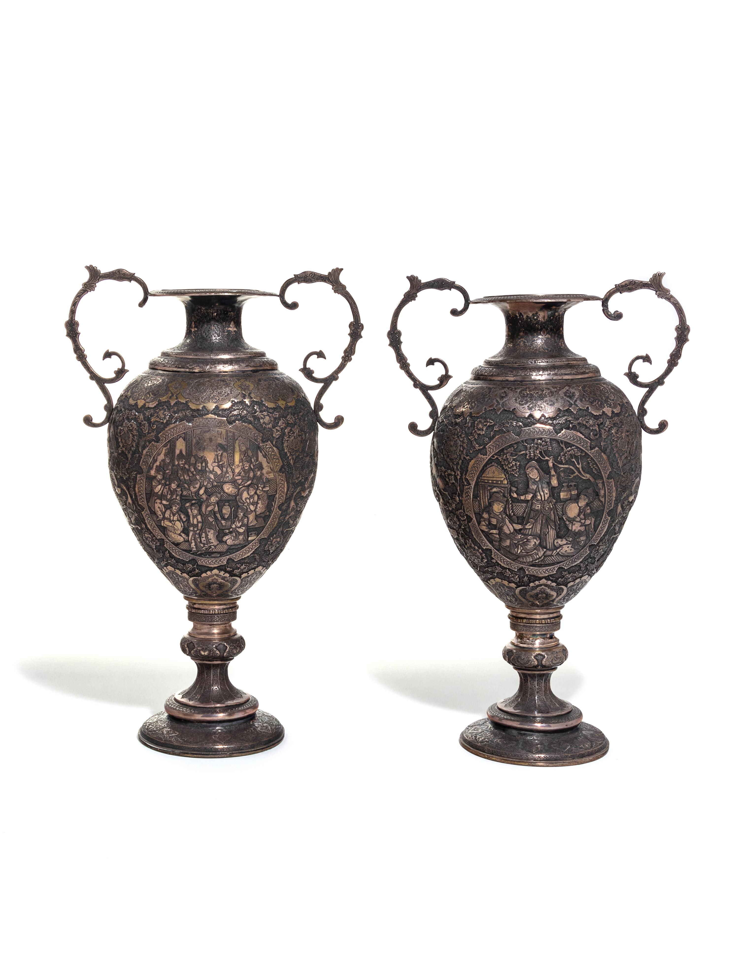 A Pair of Persian Silvered Copper Vases