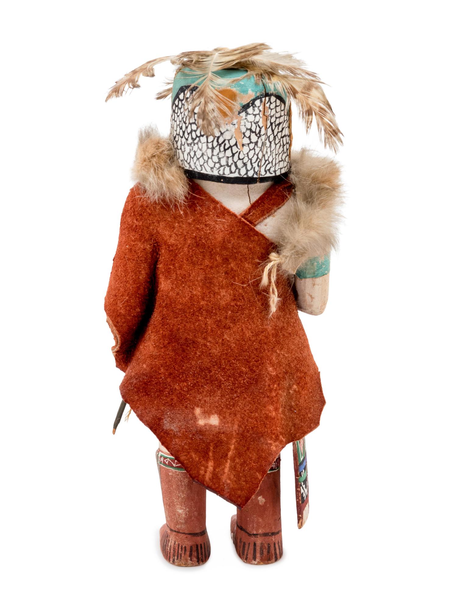 A Group of Three Katsinas including Wood Carrier, owl, and doll with case mask with protruding eyes and snout