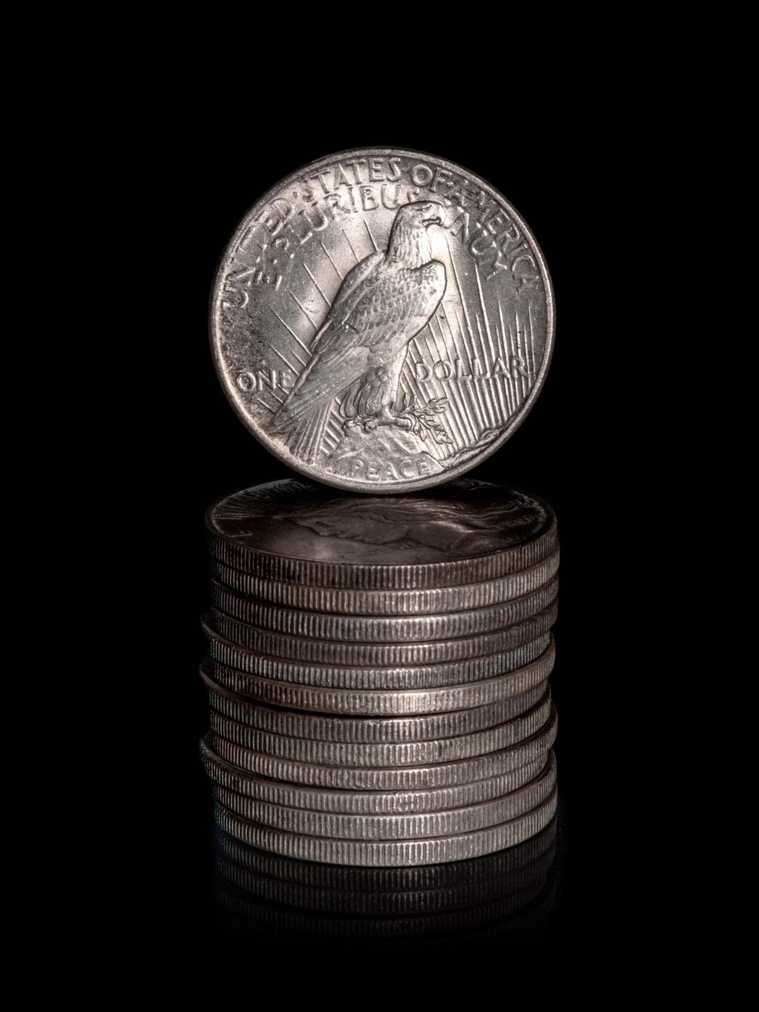 A Group of Thirteen Peace $1 Coins
