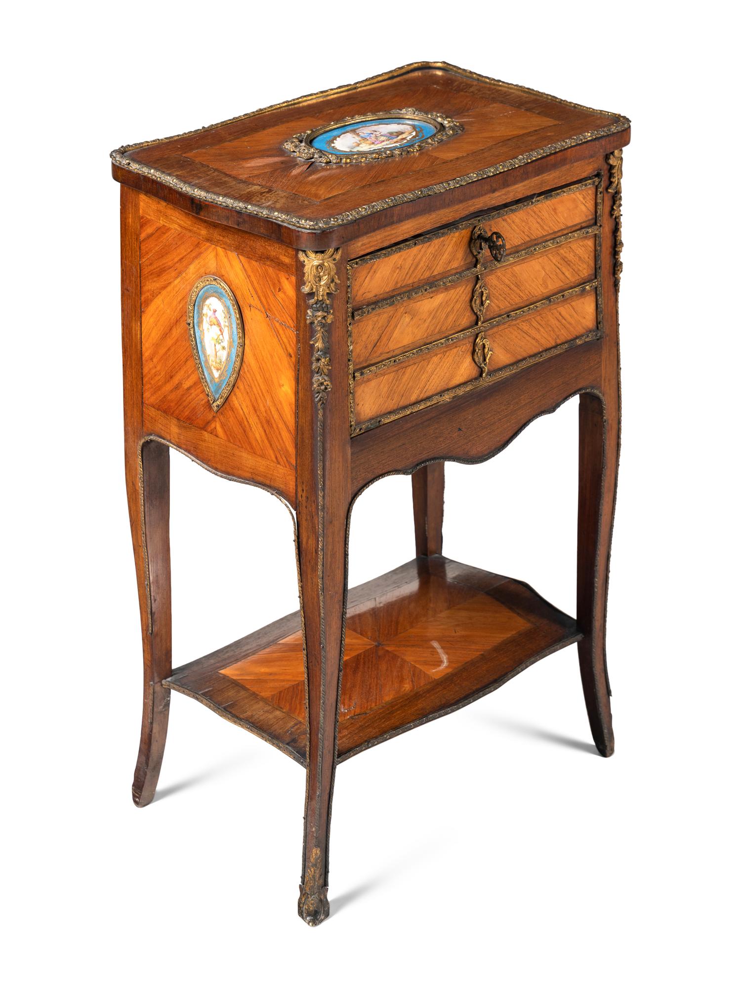 A Louis XV Style Chiffonier with Porcelain Inset Plaques
