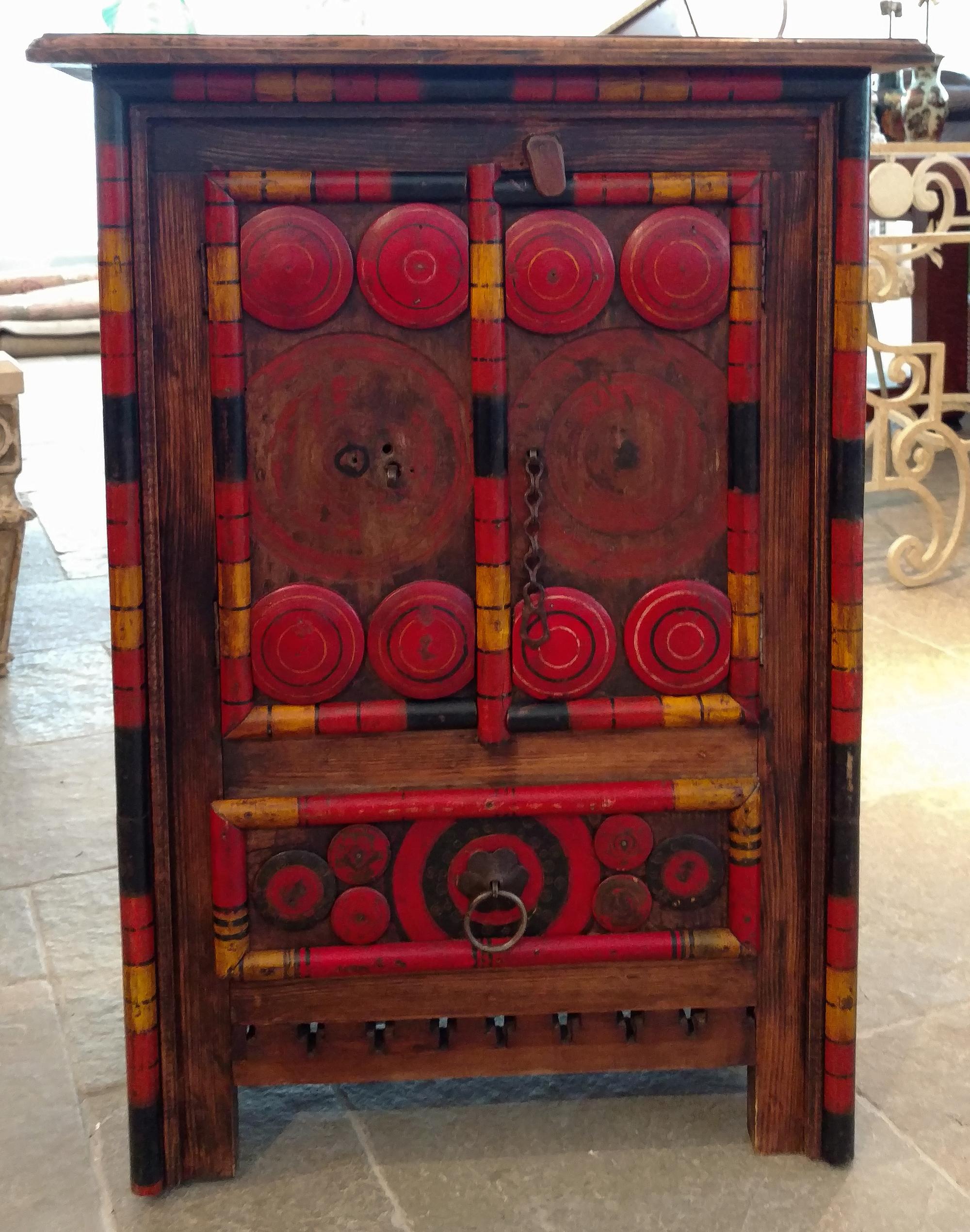 A Painted Two-Door Side Cabinet Height 34 1/2 x width 24 3/4 inches.