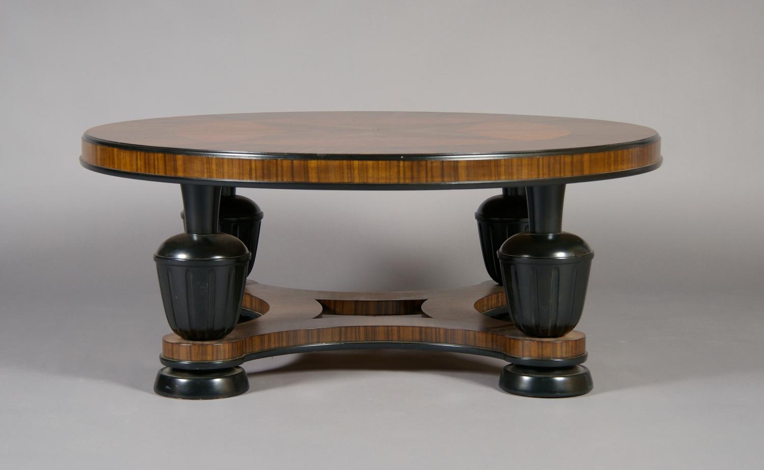 A Swedish Art Deco Rosewood and Cherry Low Table, Height 17 x diameter 41 inches.