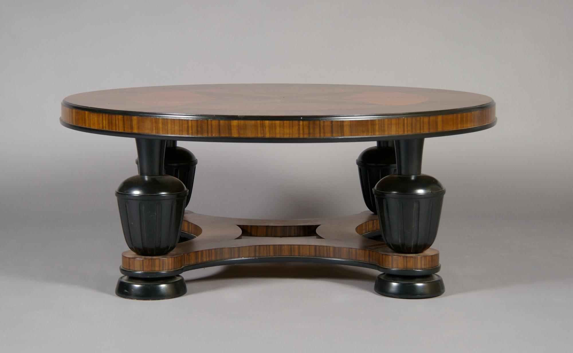 A Swedish Art Deco Rosewood and Cherry Low Table, Height 17 x diameter 41 inches.