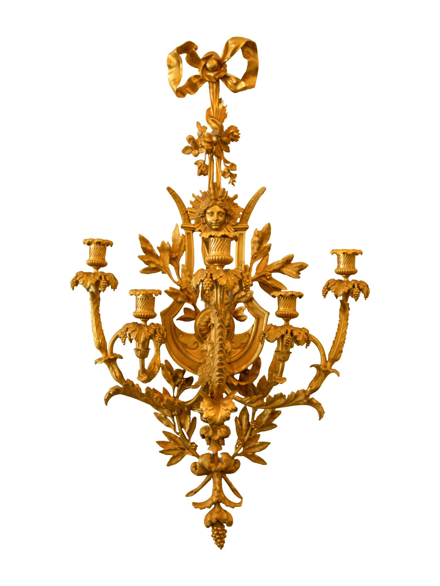 A Set of Four Louis XVI Style Gilt Bronze Five-Light Sconces