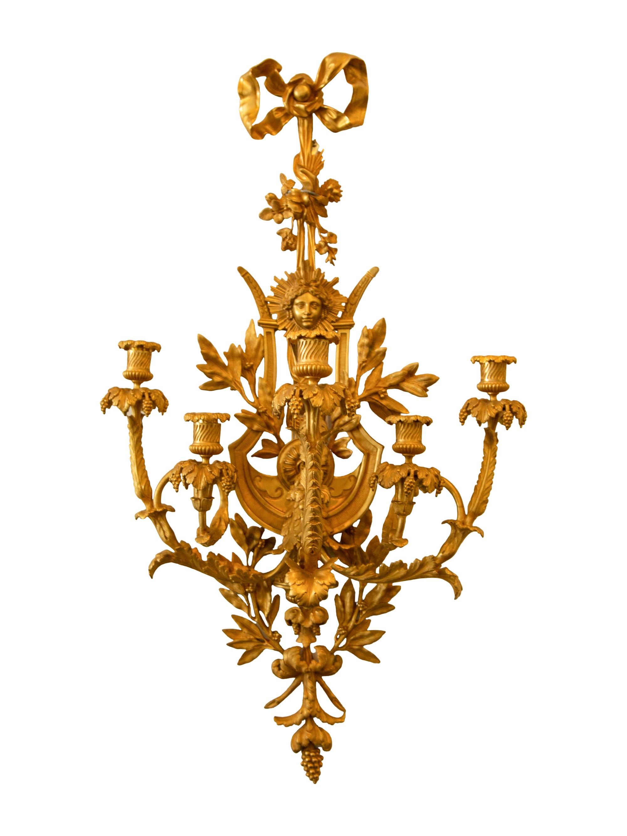 A Set of Four Louis XVI Style Gilt Bronze Five-Light Sconces