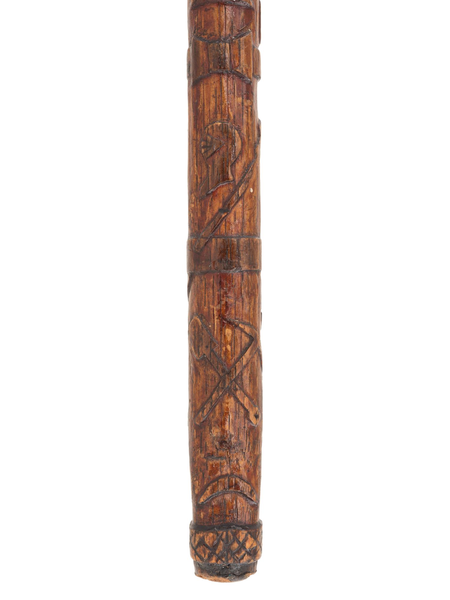 [CIVIL WAR]. GAR folk art carved cane featuring corps badges and patriotic motifs.