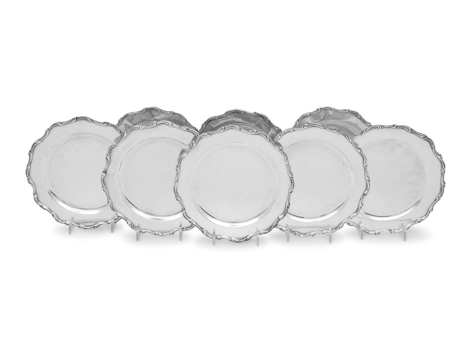 Eight Mexican Silver Bread Plates