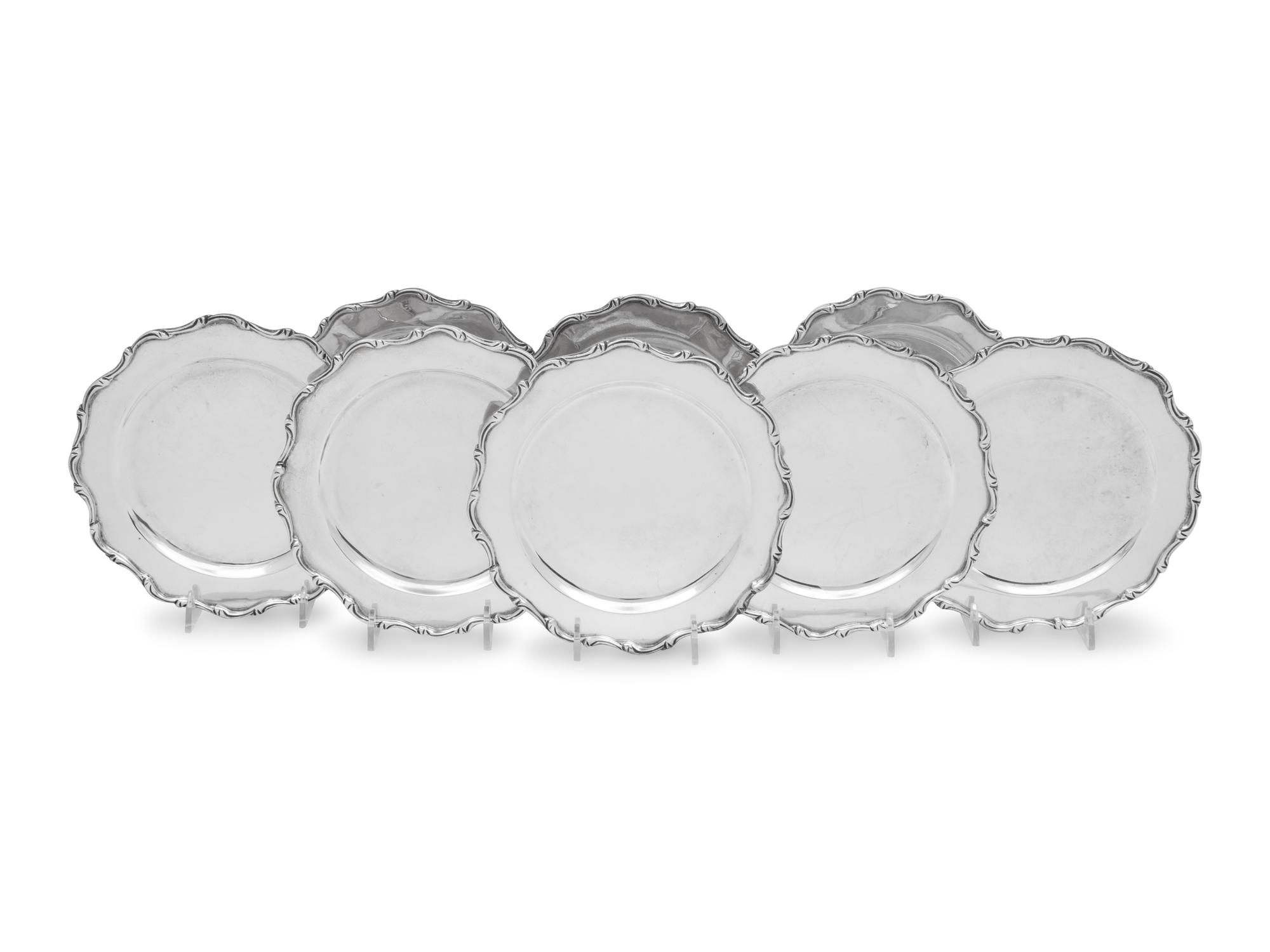 Eight Mexican Silver Bread Plates