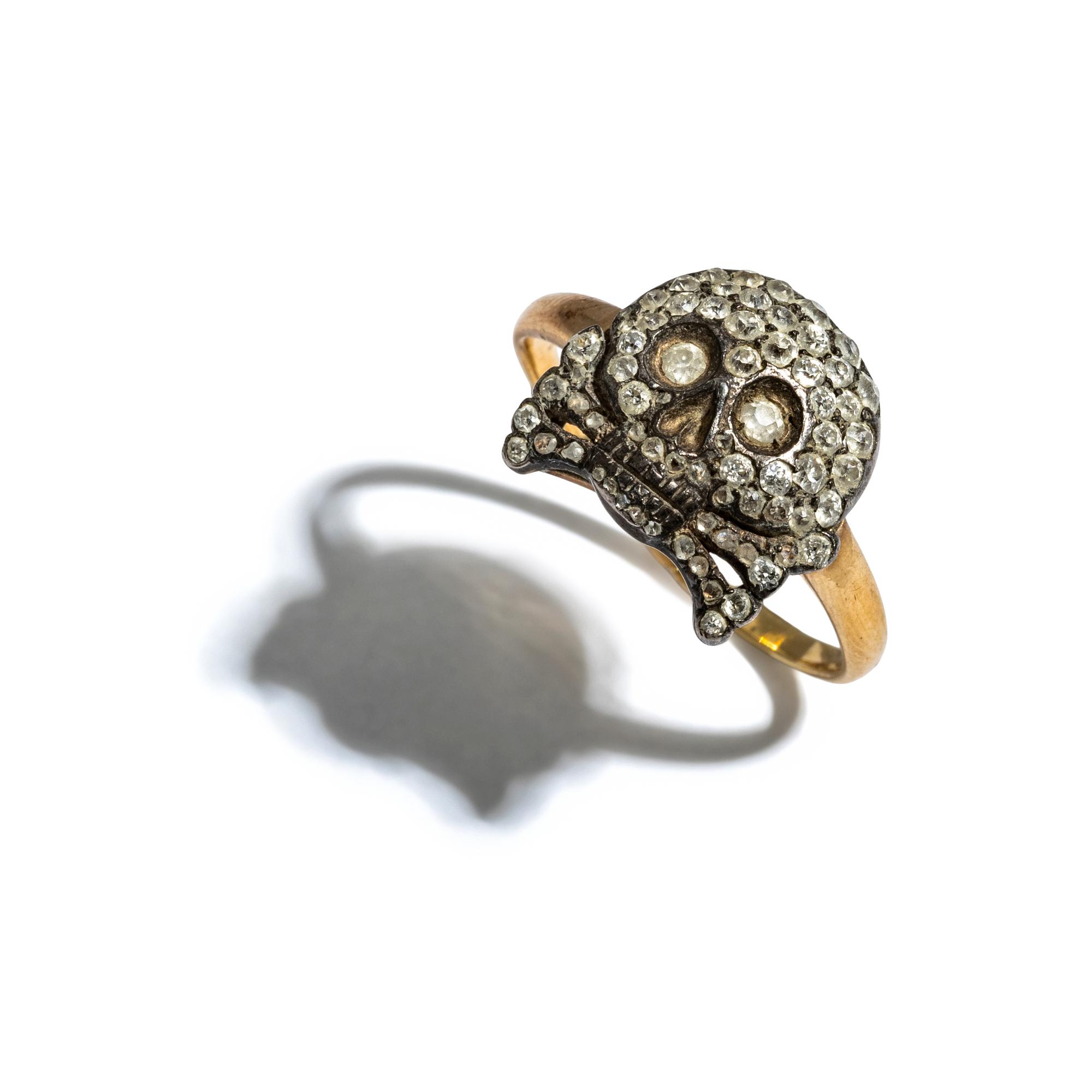 RUSSIAN, DIAMOND, SILVER, AND YELLOW GOLD SKULL AND CROSSBONES RING