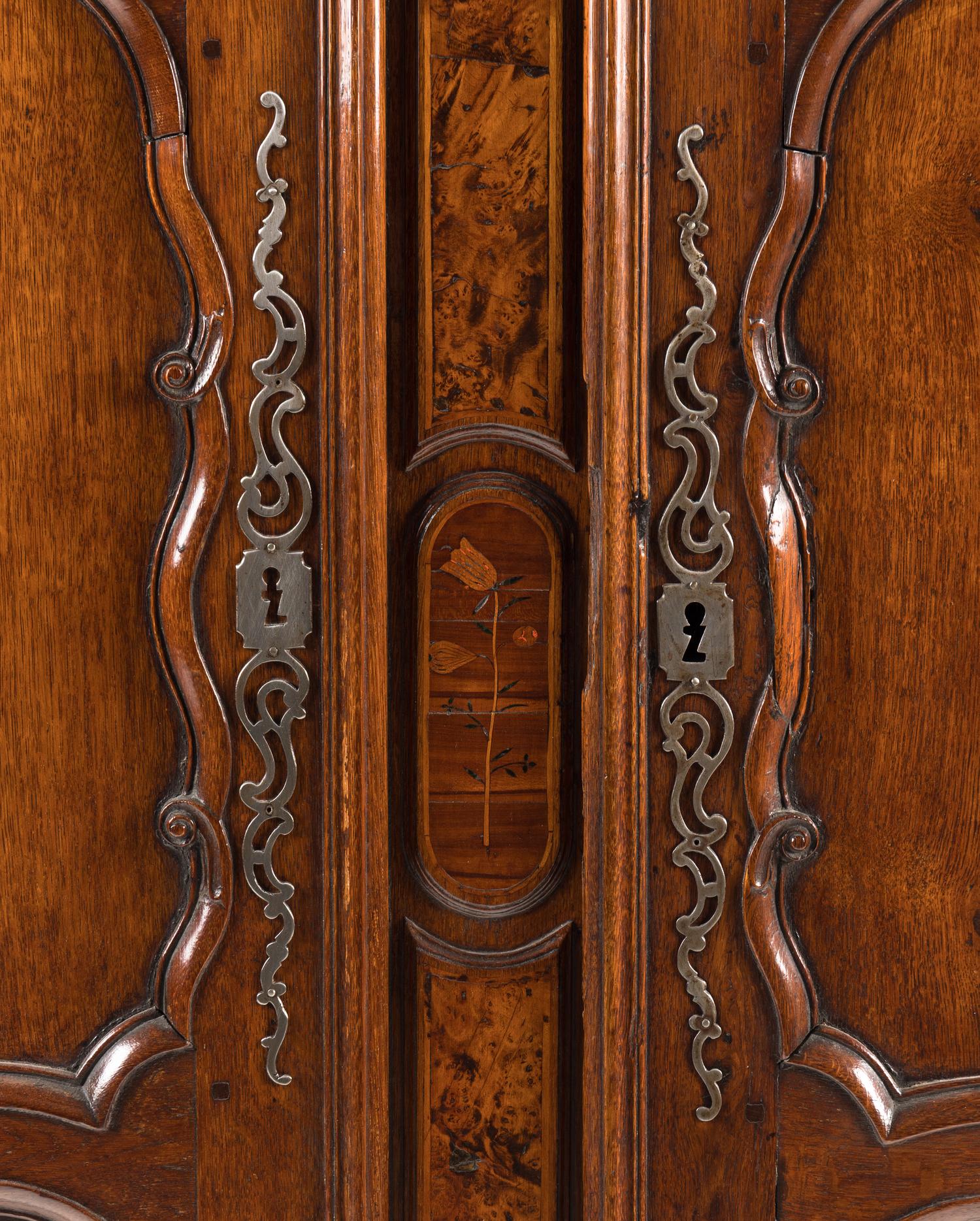 A Louis XV Walnut and Mulberry Marquetry Armoire