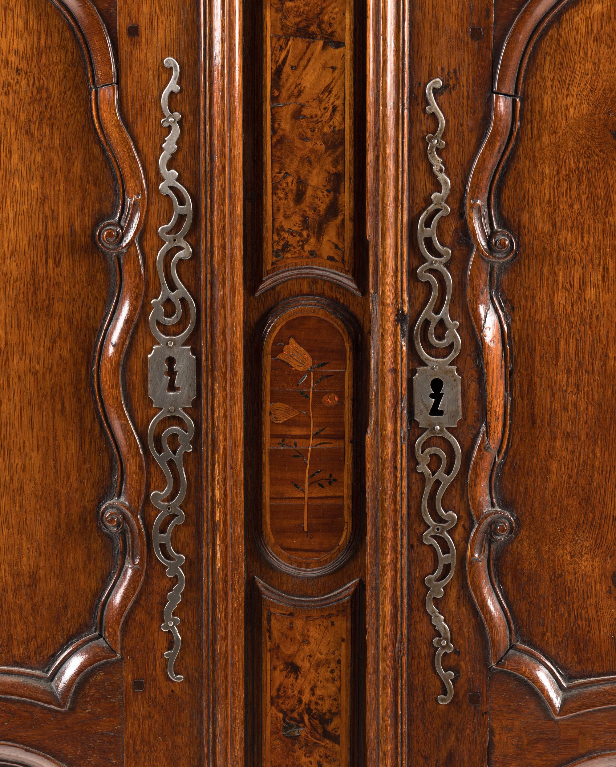 A Louis XV Walnut and Mulberry Marquetry Armoire